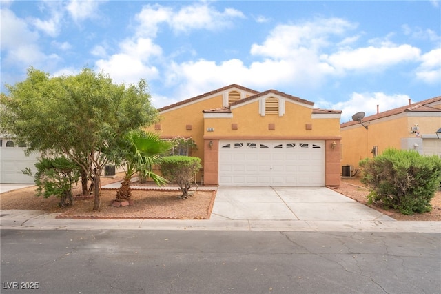 1635 Otto Merida Ave, Las Vegas, NV 89106 - view of front of house with concrete driveway, stucco siding, and a tile roof