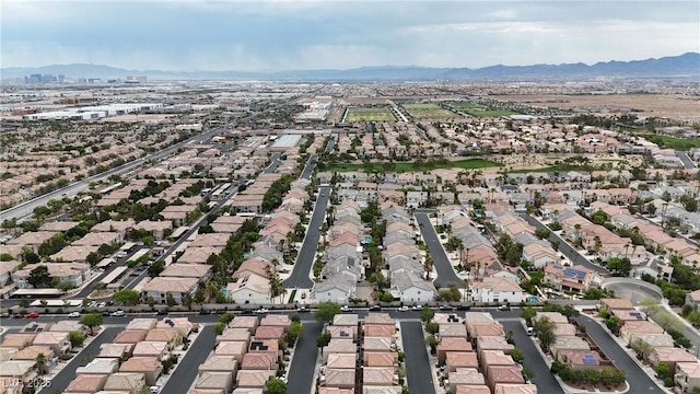 9074 Maycott Ave, Las Vegas, NV 89148 - aerial view of property and surrounding area with nearby suburban area and a mountainous background