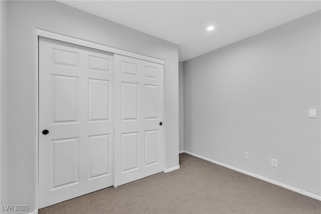 9074 Maycott Ave, Las Vegas, NV 89148 - unfurnished bedroom featuring carpet, a closet, and recessed lighting