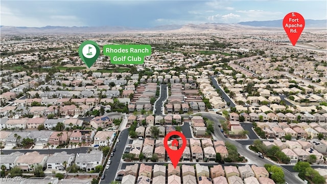 9074 Maycott Ave, Las Vegas, NV 89148 - aerial perspective of suburban area with a mountain backdrop