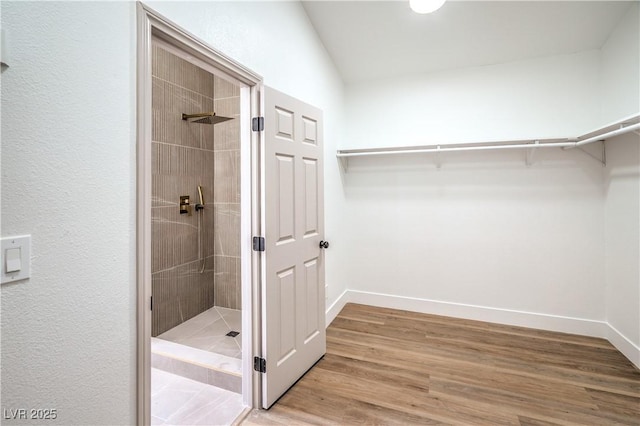 1144 Calico Ridge Dr, Henderson, NV 89011 - spacious closet featuring wood finished floors