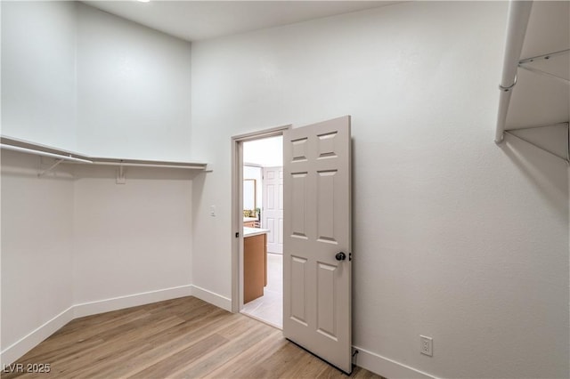 1144 Calico Ridge Dr, Henderson, NV 89011 - spacious closet with light wood-style flooring