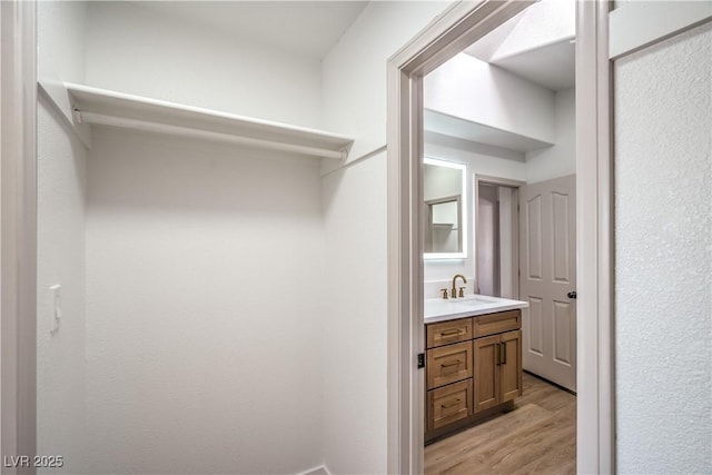 1144 Calico Ridge Dr, Henderson, NV 89011 - bathroom with vanity and wood finished floors