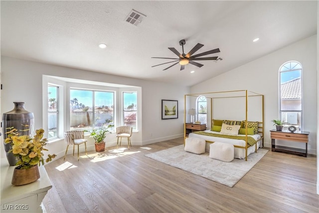 1144 Calico Ridge Dr, Henderson, NV 89011 - bedroom featuring wood finished floors, vaulted ceiling, recessed lighting, and a ceiling fan