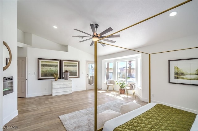 1144 Calico Ridge Dr, Henderson, NV 89011 - bedroom with wood finished floors, recessed lighting, lofted ceiling, and a ceiling fan