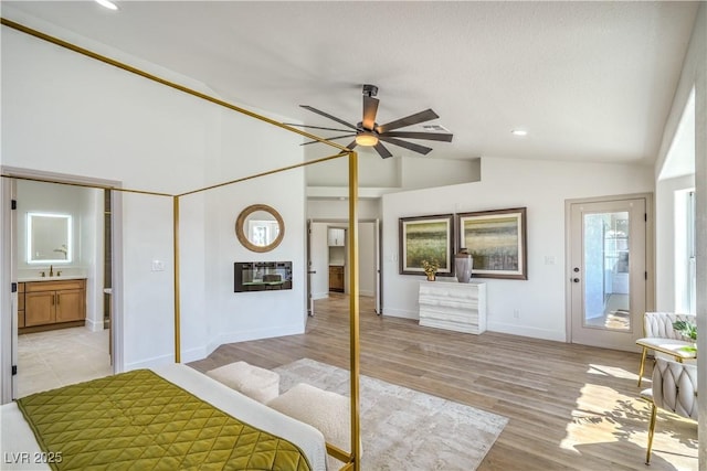 1144 Calico Ridge Dr, Henderson, NV 89011 - bedroom featuring vaulted ceiling, light wood-style flooring, recessed lighting, and heating unit