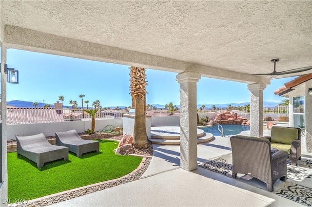 1144 Calico Ridge Dr, Henderson, NV 89011 - fenced backyard featuring a patio