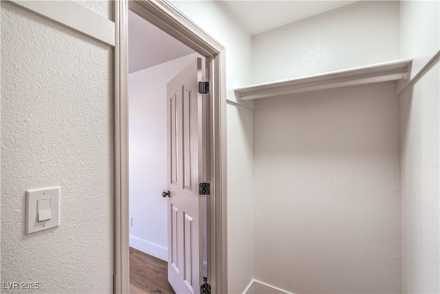 1144 Calico Ridge Dr, Henderson, NV 89011 - hallway featuring wood finished floors and baseboards