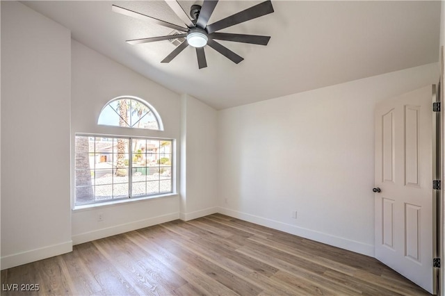 1144 Calico Ridge Dr, Henderson, NV 89011 - spare room featuring wood finished floors, lofted ceiling, and ceiling fan