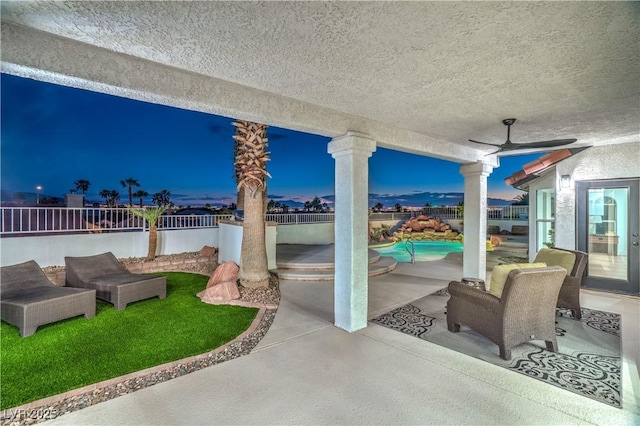 1144 Calico Ridge Dr, Henderson, NV 89011 - fenced backyard with a patio area