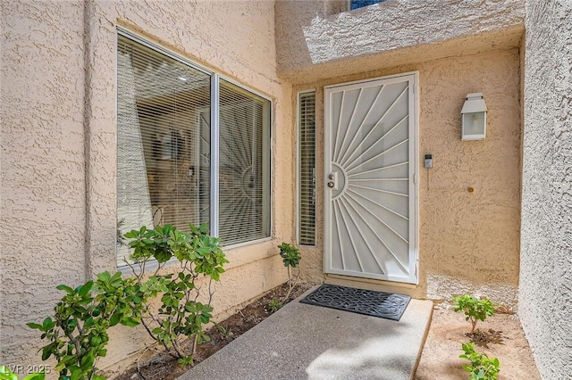 7068 Bright Springs Ct, Las Vegas, NV 89113 - entrance to property featuring stucco siding
