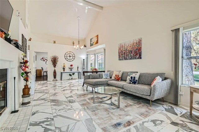 7068 Bright Springs Ct, Las Vegas, NV 89113 - living room featuring a chandelier, beamed ceiling, light marble finish floors, and high vaulted ceiling