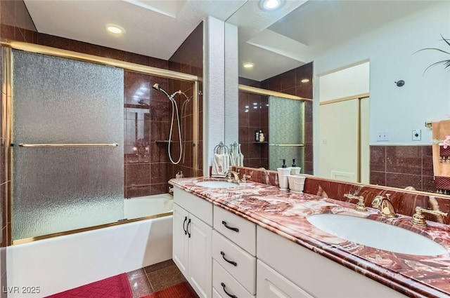 7068 Bright Springs Ct, Las Vegas, NV 89113 - bathroom with double vanity, shower / bath combination with glass door, and recessed lighting
