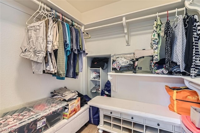 7068 Bright Springs Ct, Las Vegas, NV 89113 - walk in closet with wood finished floors