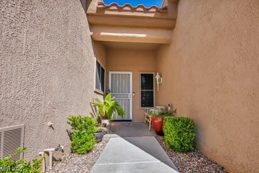 2135 Hallston St, Las Vegas, NV 89134 - property entrance featuring stucco siding