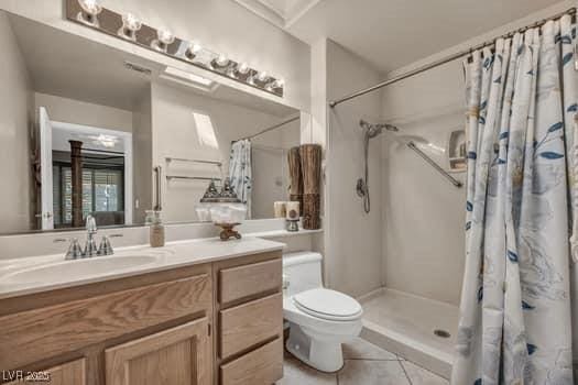 2135 Hallston St, Las Vegas, NV 89134 - bathroom with vanity, tile patterned floors, and curtained shower