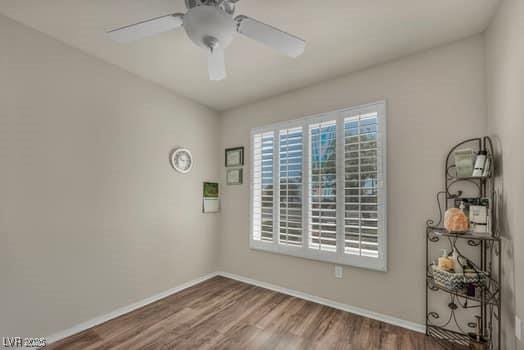 2135 Hallston St, Las Vegas, NV 89134 - unfurnished room with wood finished floors and a ceiling fan