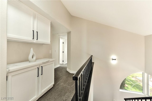 1724 Navajo Lake Way, Las Vegas, NV 89128 - hallway featuring dark colored carpet and baseboards