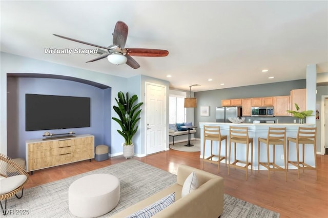 6068 Shyley St Unit 102, Henderson, NV 89011 - living area with recessed lighting, light wood-style flooring, and a ceiling fan