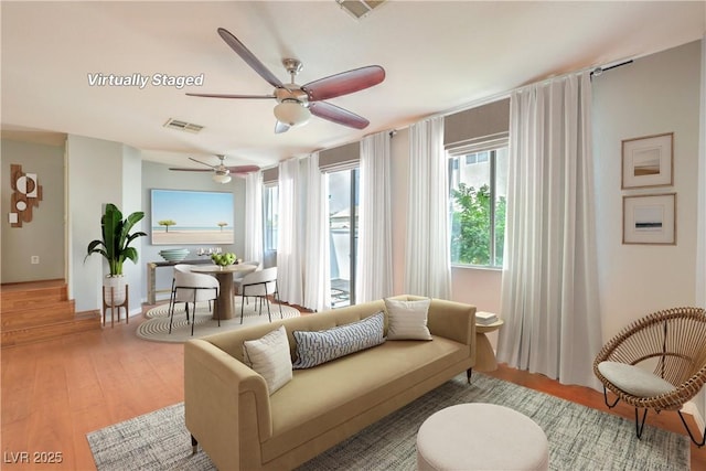6068 Shyley St Unit 102, Henderson, NV 89011 - living area featuring ceiling fan and light wood finished floors