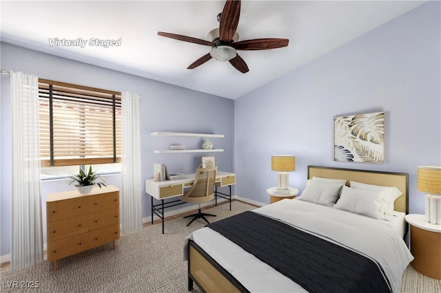 6068 Shyley St Unit 102, Henderson, NV 89011 - bedroom with vaulted ceiling, carpet flooring, and a ceiling fan