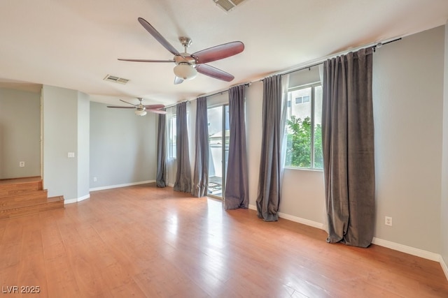 6068 Shyley St Unit 102, Henderson, NV 89011 - spare room featuring ceiling fan and light wood-style floors