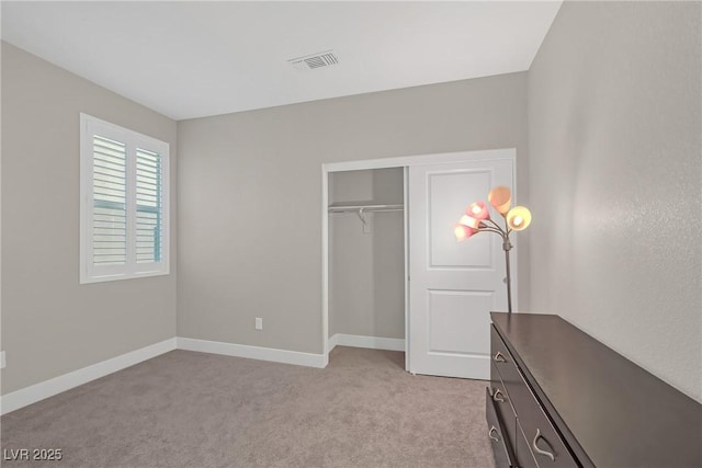 10189 Magnolia Creek St, Las Vegas, NV 89141 - unfurnished bedroom featuring light carpet and a closet