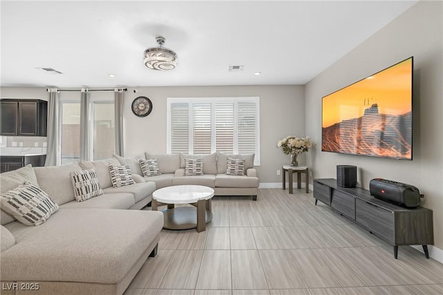 10189 Magnolia Creek St, Las Vegas, NV 89141 - living room featuring baseboards and recessed lighting