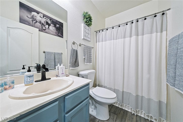 5520 Carrara Pointe St, Pahrump, NV 89061 - full bath featuring vanity, wood finished floors, and curtained shower