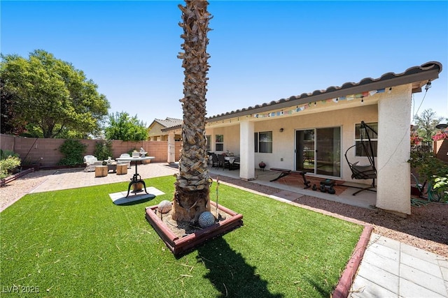 5520 Carrara Pointe St, Pahrump, NV 89061 - rear view of house featuring stucco siding, a fenced backyard, and a patio