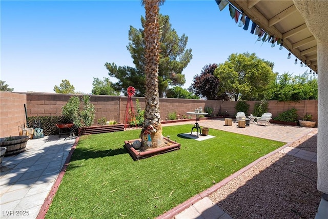 5520 Carrara Pointe St, Pahrump, NV 89061 - fenced backyard with a patio area