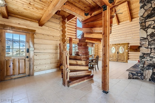 7790 Scottie St, Las Vegas, NV 89166 - tiled foyer entrance with a wood ceiling with exposed beams, plenty of natural light, rustic walls, and stairs