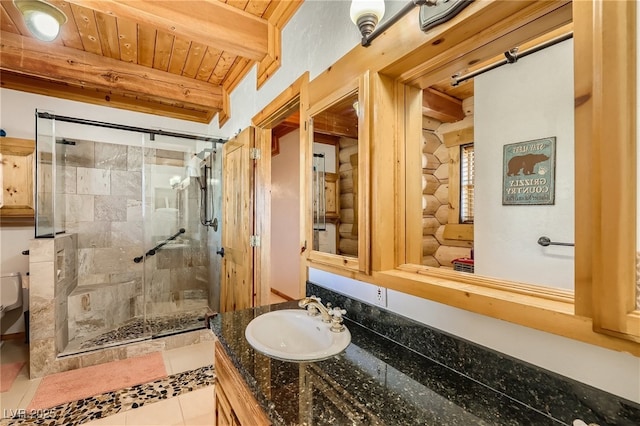 7790 Scottie St, Las Vegas, NV 89166 - full bathroom with a shower stall, vanity, a wooden ceiling with exposed beams, and tile patterned flooring