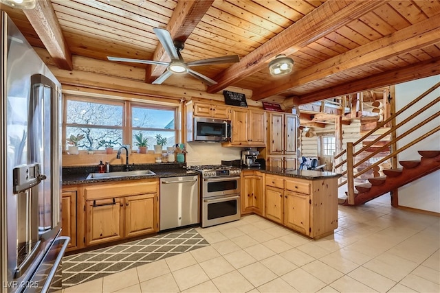 7790 Scottie St, Las Vegas, NV 89166 - kitchen featuring stainless steel appliances, a wood ceiling with exposed beams, a peninsula, light tile patterned floors, and a ceiling fan