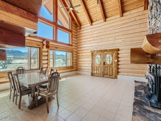 7790 Scottie St, Las Vegas, NV 89166 - tiled dining room featuring log walls, high vaulted ceiling, a wood ceiling with exposed beams, and ceiling fan