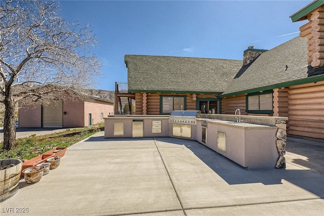 7790 Scottie St, Las Vegas, NV 89166 - view of patio featuring area for grilling and a sink