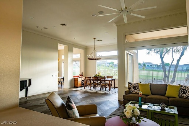 9 Knob Oak Dr, Henderson, NV 89052 - living area with ornamental molding, ceiling fan, and a chandelier