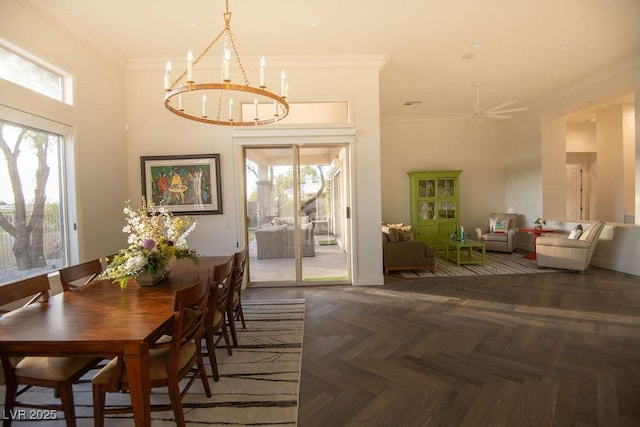 9 Knob Oak Dr, Henderson, NV 89052 - dining room featuring a chandelier, crown molding, and ceiling fan