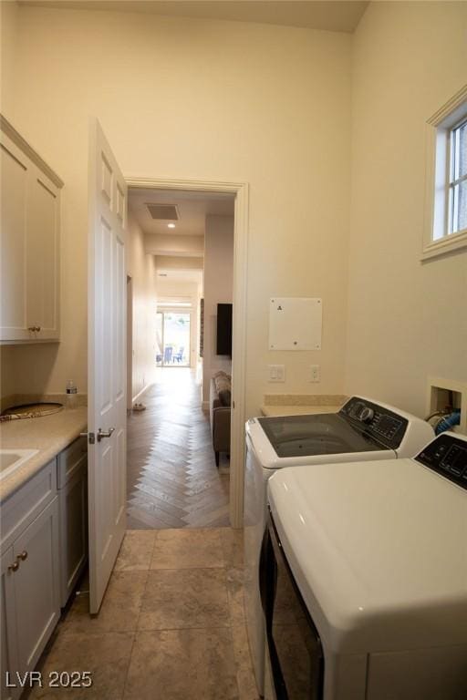 9 Knob Oak Dr, Henderson, NV 89052 - washroom with cabinet space and independent washer and dryer