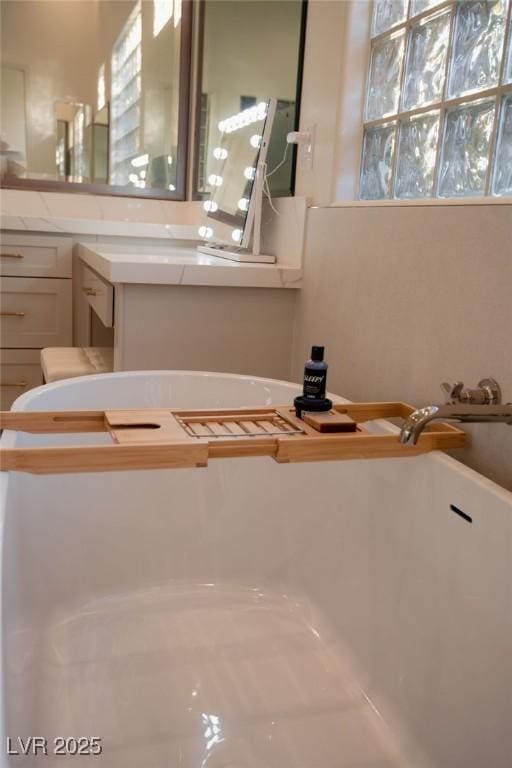 9 Knob Oak Dr, Henderson, NV 89052 - full bathroom featuring a freestanding bath and vanity