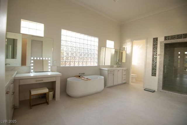 9 Knob Oak Dr, Henderson, NV 89052 - full bath with a soaking tub, healthy amount of natural light, vanity, a stall shower, and crown molding