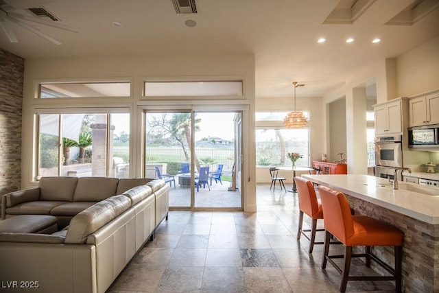 9 Knob Oak Dr, Henderson, NV 89052 - living room featuring recessed lighting and a ceiling fan