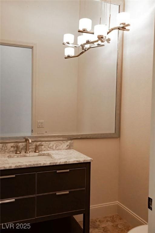 9 Knob Oak Dr, Henderson, NV 89052 - bathroom featuring vanity and baseboards