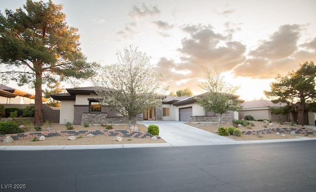 9 Knob Oak Dr, Henderson, NV 89052 - view of front of property with a garage, stucco siding, and concrete driveway