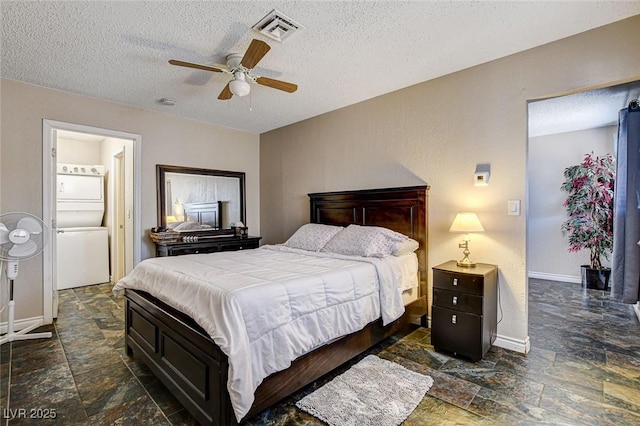 3912 Palos Verdes St, Las Vegas, NV 89119 - bedroom featuring stone tile flooring, a textured ceiling, and a ceiling fan