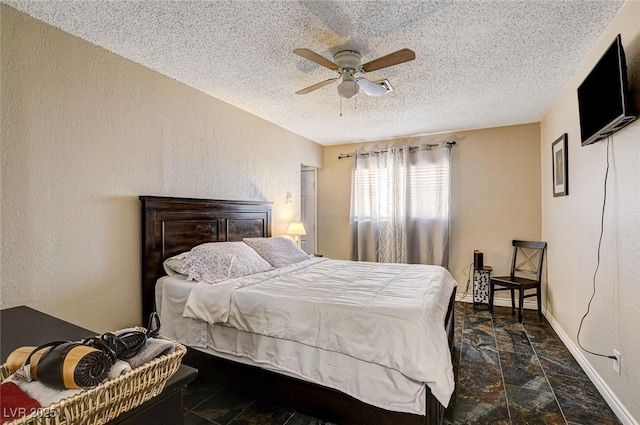 3912 Palos Verdes St, Las Vegas, NV 89119 - bedroom with stone tile flooring, a textured ceiling, and a ceiling fan