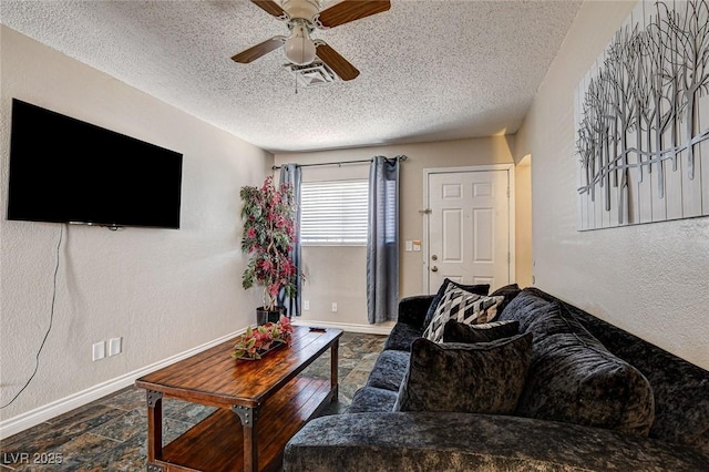 3912 Palos Verdes St, Las Vegas, NV 89119 - living room with a textured ceiling, ceiling fan, stone finish flooring, and a textured wall