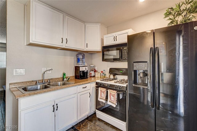 3912 Palos Verdes St, Las Vegas, NV 89119 - kitchen with refrigerator with ice dispenser, white gas range oven, black microwave, and white cabinets