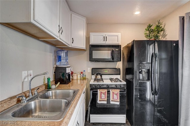 3912 Palos Verdes St, Las Vegas, NV 89119 - kitchen featuring black appliances, white cabinets, and light countertops