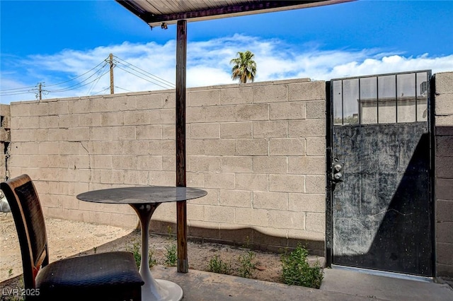 3912 Palos Verdes St, Las Vegas, NV 89119 - view of patio / terrace with a gate